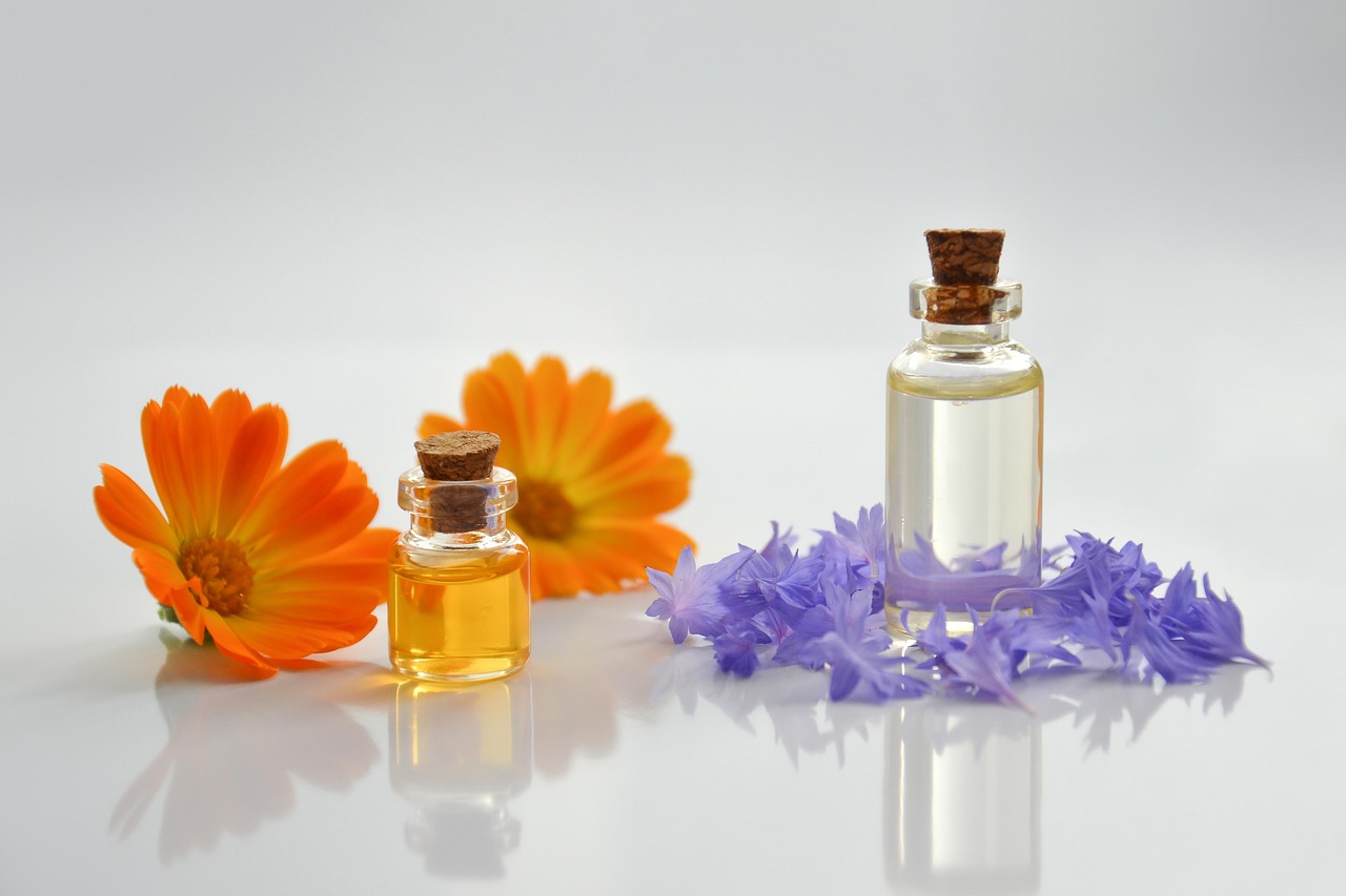 essential oil, spa, cosmetology, cosmetic oil, beauty, flowers, essential oils, glass bottle, beautiful flowers, nature, calendula, flower background, petals, orange, cornflowers, blue, medicinal plant, wellness, alternative, therapy, scent, massage, the medicine, flower wallpaper, treatment, oil, relaxation, aromatic, space for text