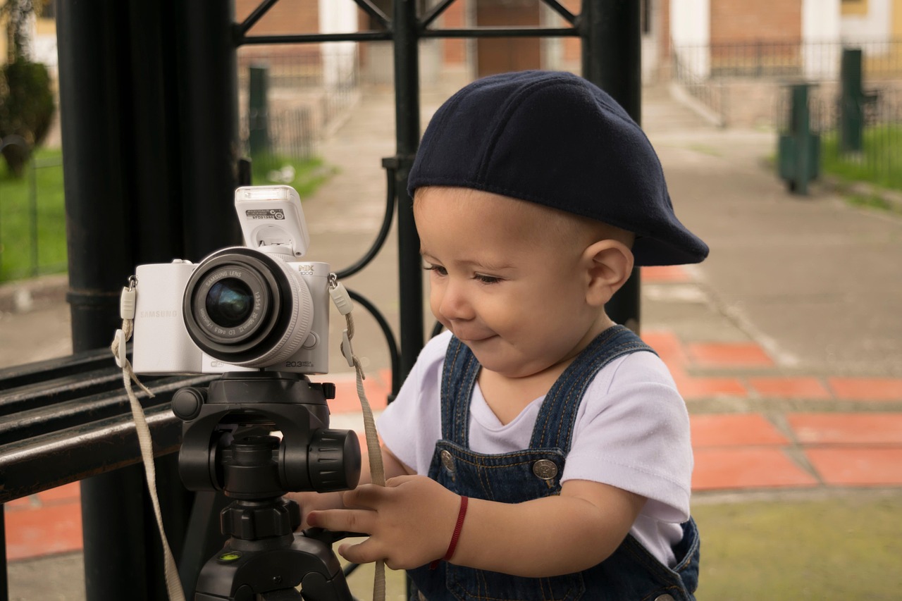 baby, camera, tripod, play, playful, child, kid, young, cute, adorable, happy, photographer, portrait